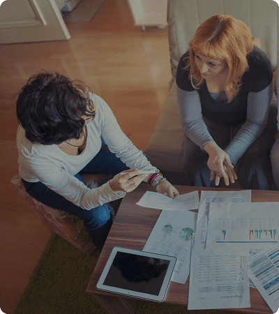 Collaborative meeting with charts and digital tablet