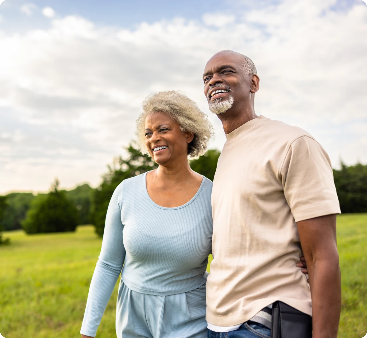 Happy couple strolling in nature