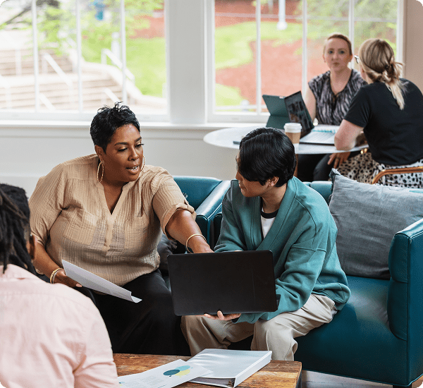 Team collaboration in an office lounge.