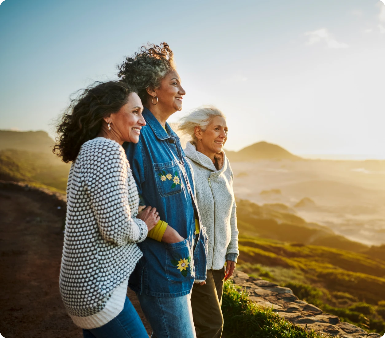 Three women enjoying a scenic view